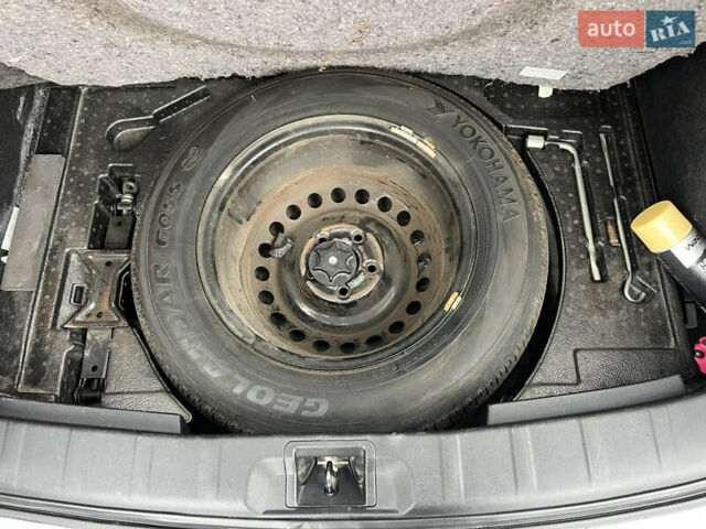 Сірий Ніссан Rogue, об'ємом двигуна 2 л та пробігом 143 тис. км за 12700 $, фото 6 на Automoto.ua