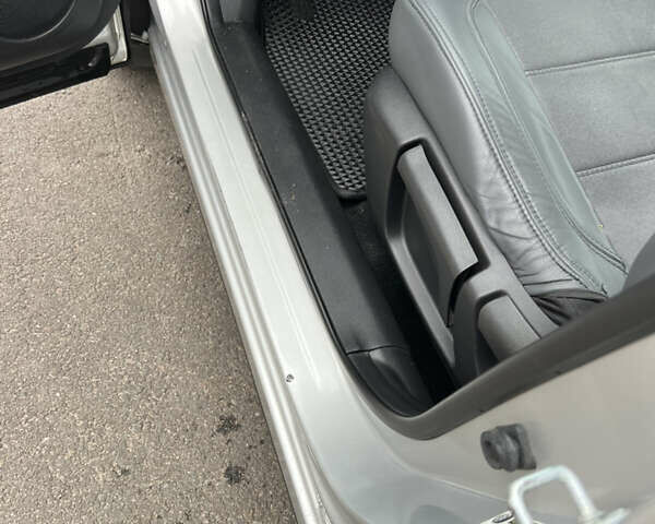 Сірий Ніссан Rogue, об'ємом двигуна 2 л та пробігом 143 тис. км за 12700 $, фото 8 на Automoto.ua