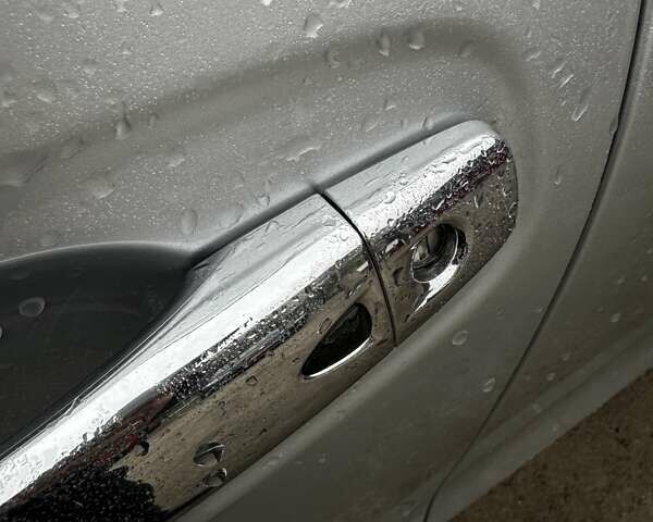 Серый Ниссан Rogue, объемом двигателя 2.5 л и пробегом 117 тыс. км за 14900 $, фото 5 на Automoto.ua