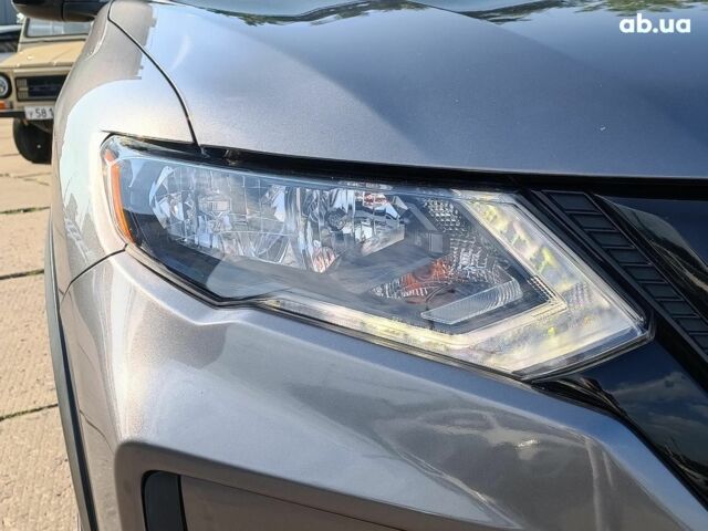 Серый Ниссан Rogue, объемом двигателя 2.5 л и пробегом 57 тыс. км за 15890 $, фото 4 на Automoto.ua