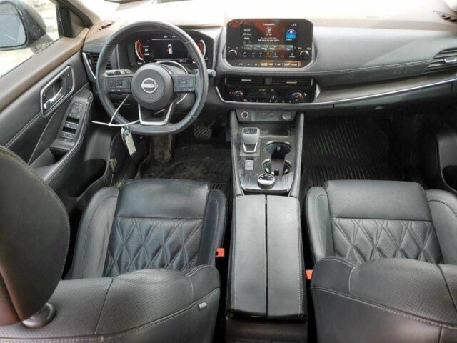 Серый Ниссан Rogue, объемом двигателя 1.5 л и пробегом 52 тыс. км за 11000 $, фото 8 на Automoto.ua