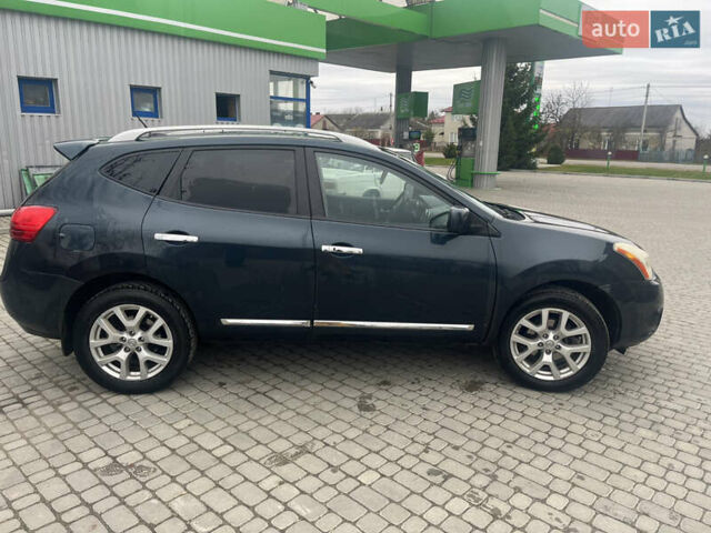 Синий Ниссан Rogue, объемом двигателя 2.49 л и пробегом 204 тыс. км за 7750 $, фото 2 на Automoto.ua