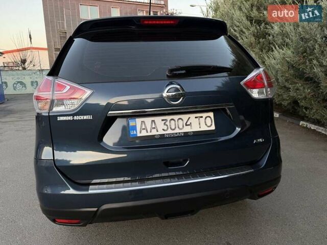 Синий Ниссан Rogue, объемом двигателя 2.49 л и пробегом 128 тыс. км за 10800 $, фото 4 на Automoto.ua