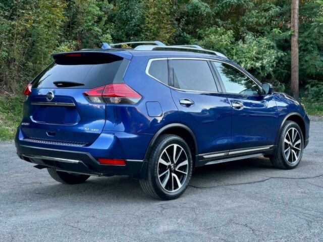 Синий Ниссан Rogue, объемом двигателя 2.5 л и пробегом 66 тыс. км за 3125 $, фото 5 на Automoto.ua