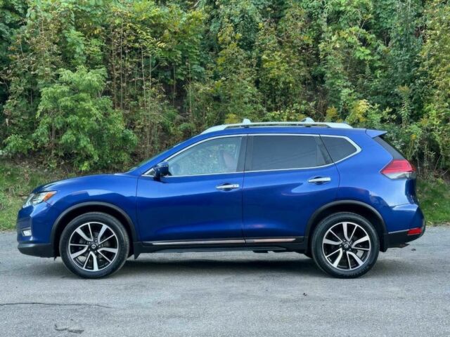 Синий Ниссан Rogue, объемом двигателя 2.5 л и пробегом 66 тыс. км за 3125 $, фото 4 на Automoto.ua