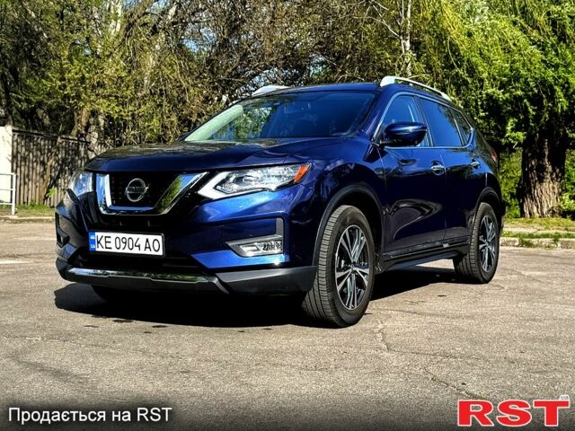 Синий Ниссан Rogue, объемом двигателя 2.5 л и пробегом 124 тыс. км за 16500 $, фото 2 на Automoto.ua