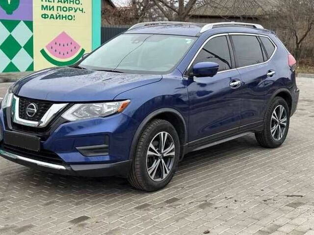 Синий Ниссан Rogue, объемом двигателя 2.5 л и пробегом 133 тыс. км за 12200 $, фото 1 на Automoto.ua