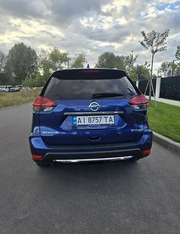 Синий Ниссан Rogue, объемом двигателя 2.5 л и пробегом 74 тыс. км за 18200 $, фото 2 на Automoto.ua