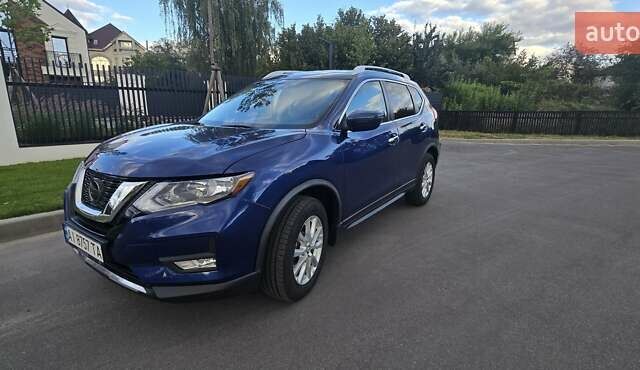 Синий Ниссан Rogue, объемом двигателя 2.5 л и пробегом 74 тыс. км за 18200 $, фото 4 на Automoto.ua