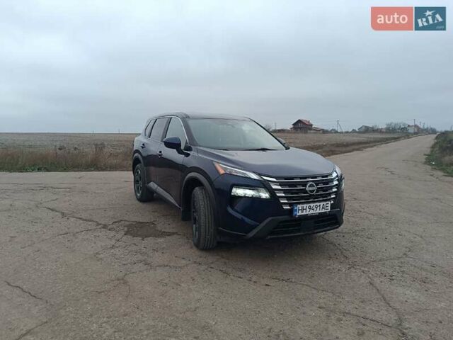 Синий Ниссан Rogue, объемом двигателя 1.5 л и пробегом 6 тыс. км за 25400 $, фото 2 на Automoto.ua