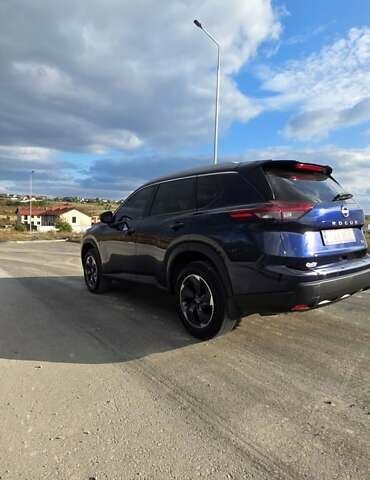 Синий Ниссан Rogue, объемом двигателя 1.5 л и пробегом 7 тыс. км за 23999 $, фото 1 на Automoto.ua