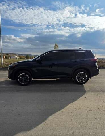 Синий Ниссан Rogue, объемом двигателя 1.5 л и пробегом 7 тыс. км за 23999 $, фото 4 на Automoto.ua