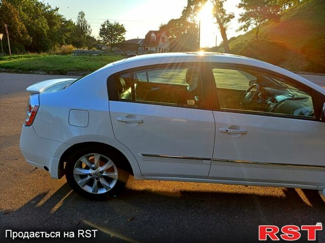 Білий Ніссан Сентра, об'ємом двигуна 2 л та пробігом 134 тис. км за 7600 $, фото 10 на Automoto.ua