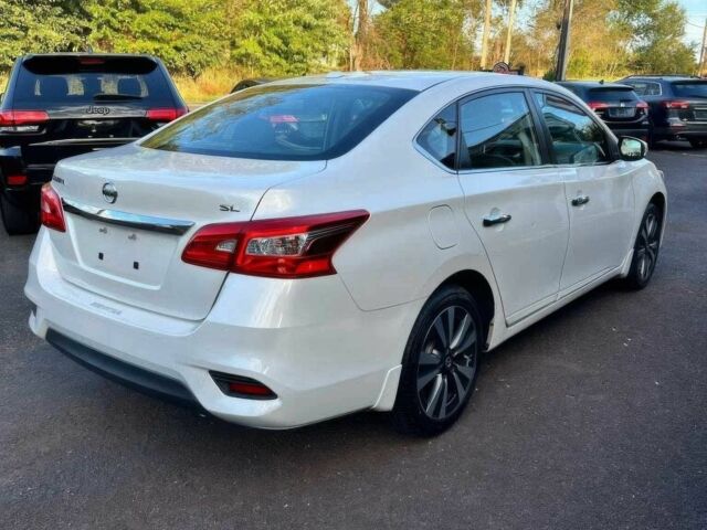 Білий Ніссан Сентра, об'ємом двигуна 1.8 л та пробігом 36 тис. км за 7000 $, фото 4 на Automoto.ua