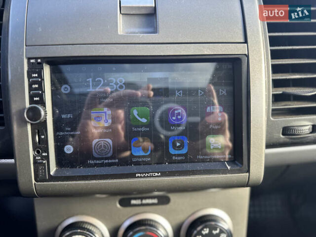 Черный Ниссан Сентра, объемом двигателя 2 л и пробегом 132 тыс. км за 5000 $, фото 17 на Automoto.ua