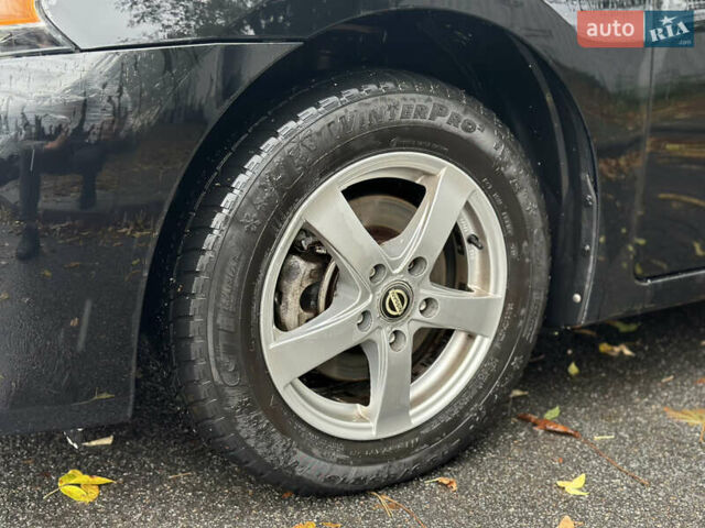 Черный Ниссан Сентра, объемом двигателя 1.8 л и пробегом 185 тыс. км за 6500 $, фото 14 на Automoto.ua