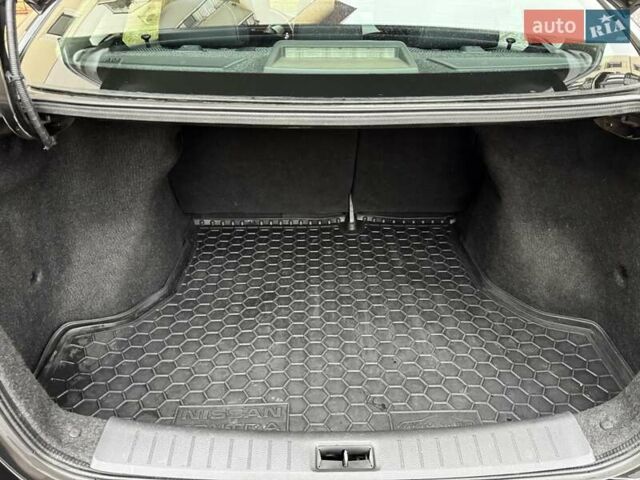 Чорний Ніссан Сентра, об'ємом двигуна 1.6 л та пробігом 195 тис. км за 8600 $, фото 18 на Automoto.ua