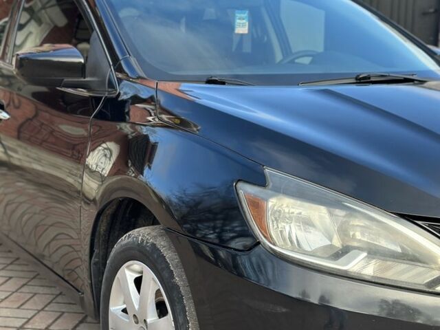 Черный Ниссан Сентра, объемом двигателя 1.8 л и пробегом 145 тыс. км за 7800 $, фото 4 на Automoto.ua