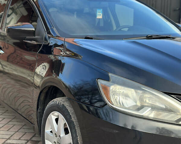 Черный Ниссан Сентра, объемом двигателя 1.8 л и пробегом 145 тыс. км за 7800 $, фото 4 на Automoto.ua