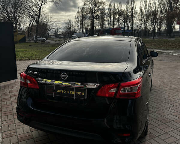 Черный Ниссан Сентра, объемом двигателя 1.8 л и пробегом 145 тыс. км за 7800 $, фото 7 на Automoto.ua