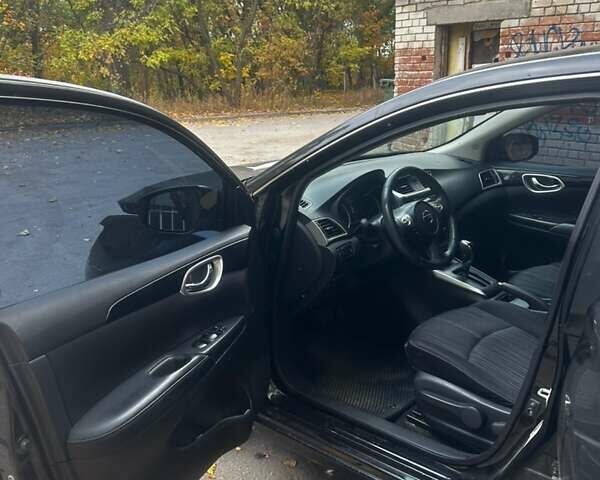 Черный Ниссан Сентра, объемом двигателя 1.8 л и пробегом 150 тыс. км за 7000 $, фото 4 на Automoto.ua