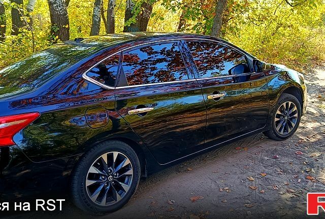 Черный Ниссан Сентра, объемом двигателя 1.8 л и пробегом 164 тыс. км за 10800 $, фото 4 на Automoto.ua