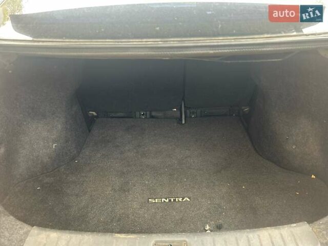 Черный Ниссан Сентра, объемом двигателя 1.8 л и пробегом 150 тыс. км за 7000 $, фото 29 на Automoto.ua