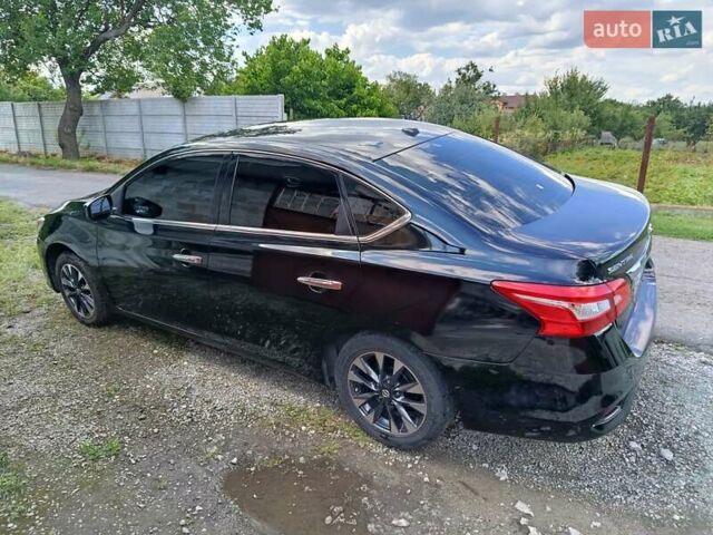 Черный Ниссан Сентра, объемом двигателя 1.8 л и пробегом 161 тыс. км за 11000 $, фото 1 на Automoto.ua