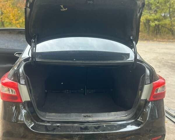 Черный Ниссан Сентра, объемом двигателя 1.8 л и пробегом 150 тыс. км за 7000 $, фото 26 на Automoto.ua