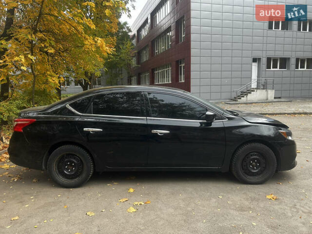 Черный Ниссан Сентра, объемом двигателя 1.8 л и пробегом 150 тыс. км за 7000 $, фото 14 на Automoto.ua