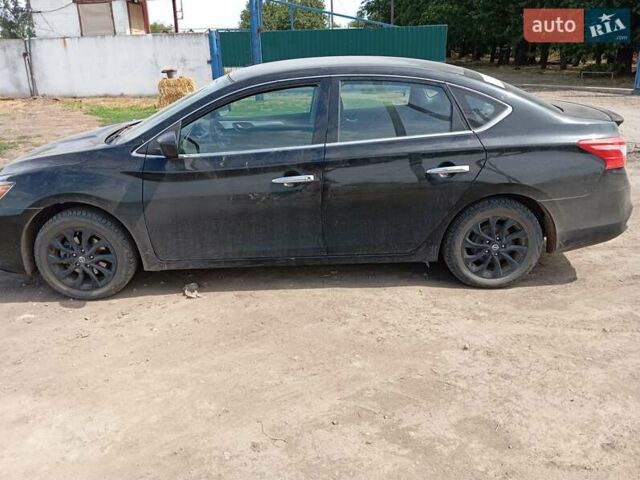 Черный Ниссан Сентра, объемом двигателя 1.8 л и пробегом 150 тыс. км за 9000 $, фото 2 на Automoto.ua