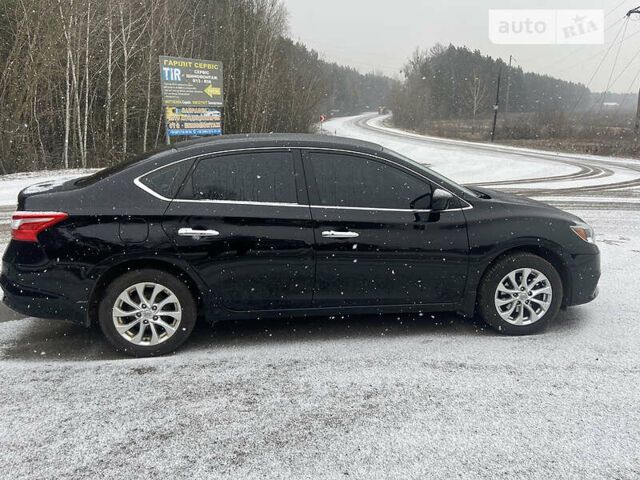 Чорний Ніссан Сентра, об'ємом двигуна 1.8 л та пробігом 65 тис. км за 11000 $, фото 6 на Automoto.ua