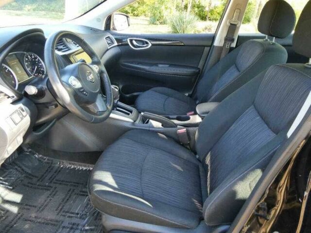 Черный Ниссан Сентра, объемом двигателя 1.8 л и пробегом 45 тыс. км за 1800 $, фото 4 на Automoto.ua