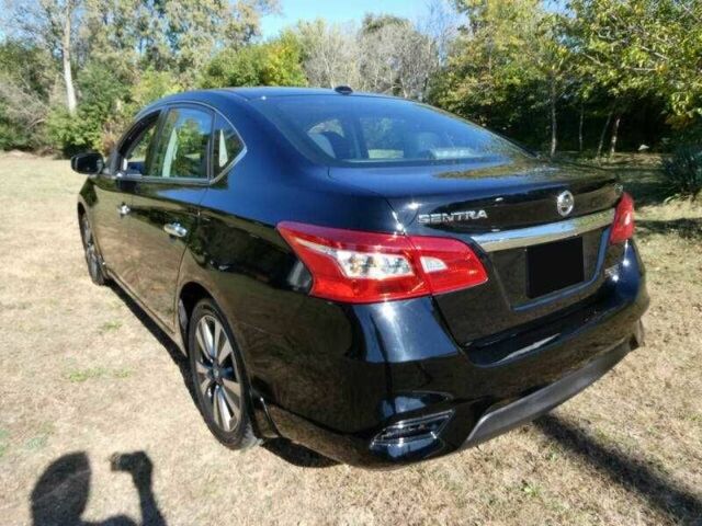 Черный Ниссан Сентра, объемом двигателя 1.8 л и пробегом 45 тыс. км за 1800 $, фото 1 на Automoto.ua