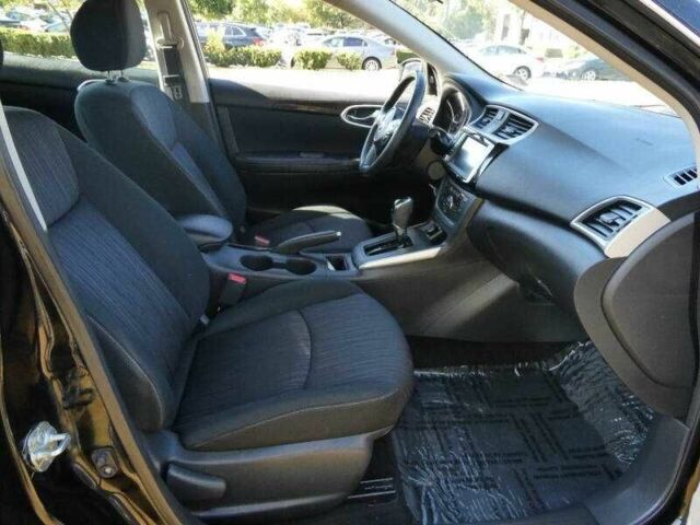 Черный Ниссан Сентра, объемом двигателя 1.8 л и пробегом 45 тыс. км за 1800 $, фото 7 на Automoto.ua