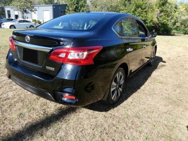 Черный Ниссан Сентра, объемом двигателя 1.8 л и пробегом 45 тыс. км за 1800 $, фото 2 на Automoto.ua