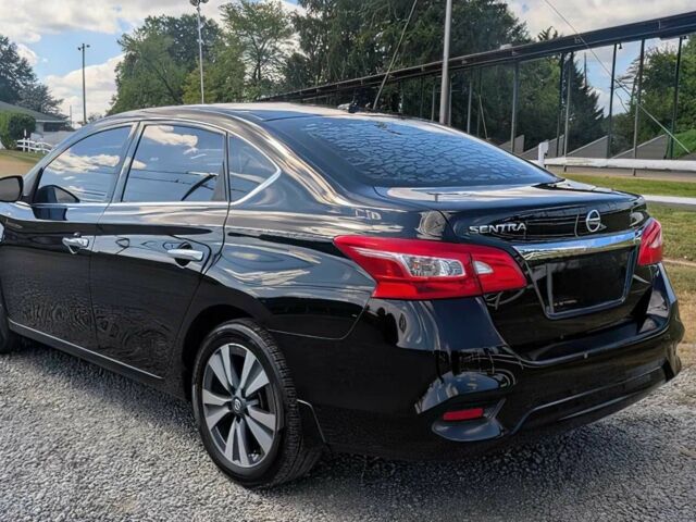 Чорний Ніссан Сентра, об'ємом двигуна 1.8 л та пробігом 30 тис. км за 7000 $, фото 6 на Automoto.ua