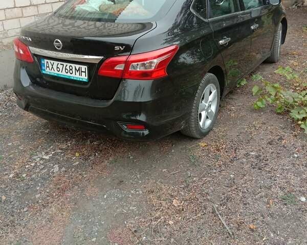 Черный Ниссан Сентра, объемом двигателя 1.8 л и пробегом 72 тыс. км за 11400 $, фото 4 на Automoto.ua