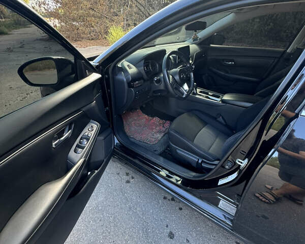 Чорний Ніссан Сентра, об'ємом двигуна 2 л та пробігом 78 тис. км за 13700 $, фото 10 на Automoto.ua