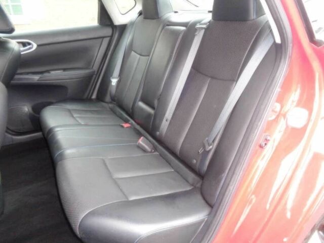 Красный Ниссан Сентра, объемом двигателя 1.6 л и пробегом 65 тыс. км за 2100 $, фото 10 на Automoto.ua