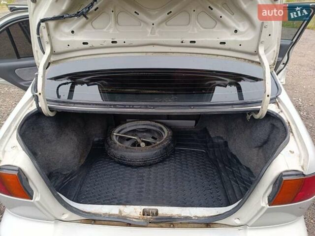 Серый Ниссан Сентра, объемом двигателя 1.6 л и пробегом 292 тыс. км за 2200 $, фото 15 на Automoto.ua