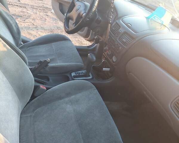 Серый Ниссан Сентра, объемом двигателя 1.8 л и пробегом 214 тыс. км за 4100 $, фото 4 на Automoto.ua