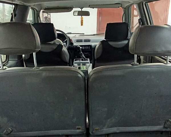 Белый Ниссан Серена, объемом двигателя 1.6 л и пробегом 300 тыс. км за 1750 $, фото 4 на Automoto.ua