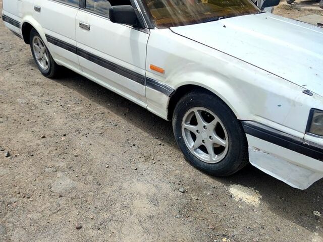 Белый Ниссан Скайлайн, объемом двигателя 1.8 л и пробегом 200 тыс. км за 1400 $, фото 7 на Automoto.ua