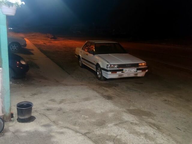 Белый Ниссан Скайлайн, объемом двигателя 1.8 л и пробегом 200 тыс. км за 1400 $, фото 2 на Automoto.ua