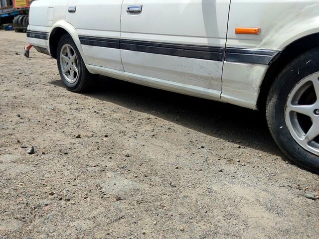 Белый Ниссан Скайлайн, объемом двигателя 1.8 л и пробегом 200 тыс. км за 1400 $, фото 6 на Automoto.ua