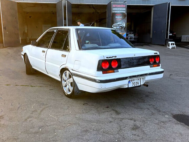 Белый Ниссан Скайлайн, объемом двигателя 1.7 л и пробегом 250 тыс. км за 1200 $, фото 3 на Automoto.ua