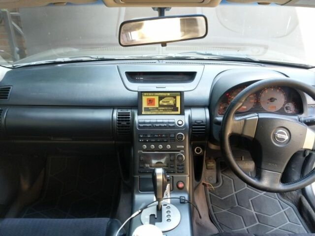 Бежевый Ниссан Скайлайн, объемом двигателя 2.5 л и пробегом 190 тыс. км за 2500 $, фото 4 на Automoto.ua