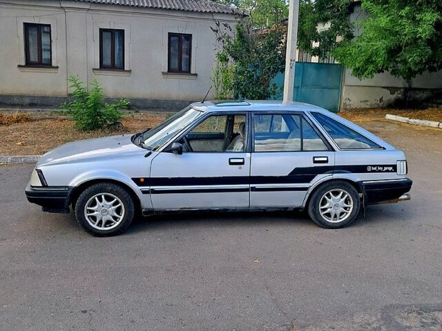 Серый Ниссан Станза, объемом двигателя 1.8 л и пробегом 315 тыс. км за 1000 $, фото 3 на Automoto.ua