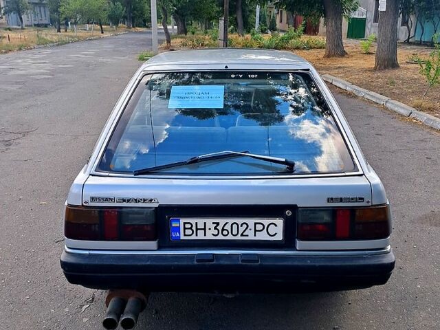 Серый Ниссан Станза, объемом двигателя 1.8 л и пробегом 315 тыс. км за 1000 $, фото 2 на Automoto.ua